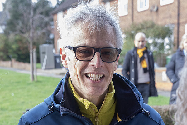 Daisy Cooper and Jesus Pastor on a constituent's doorstep