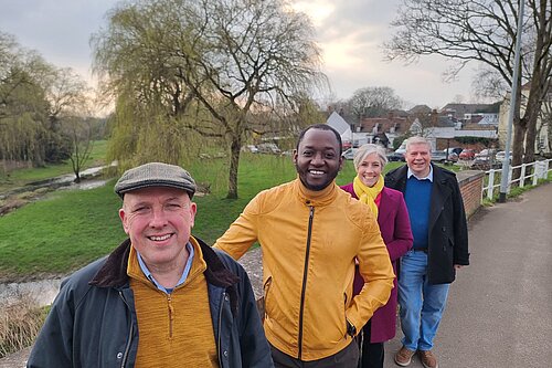 Image of the London Colney councillors, stood behind one another, across a bridge in London Colney Ward