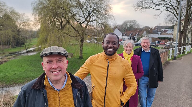 Image of the London Colney councillors, stood behind one another, across a bridge in London Colney Ward 